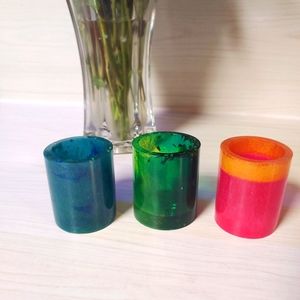 Q tip holders or shot glasses.